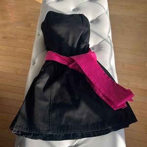 Black cocktail dress with hot pink sash